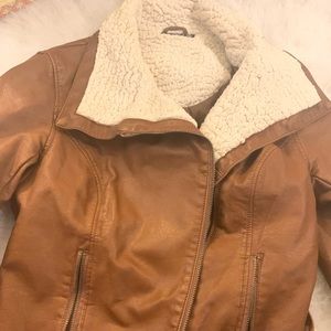 Leather jacket with fuzzy collar